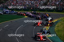 Sebastian Vettel (GER) Ferrari SF70H at the start of the race. 26.03.2017. Formula 1 World Championship, Rd 1, Australian Grand Prix, Albert Park, Melbourne, Australia, Race Day.