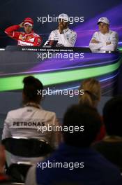 The post qualifying FIA Press Conference (L to R): Sebastian Vettel (GER) Ferrari; Lewis Hamilton (GBR) Mercedes AMG F1; Valtteri Bottas (FIN) Mercedes AMG F1. 25.03.2017. Formula 1 World Championship, Rd 1, Australian Grand Prix, Albert Park, Melbourne, Australia, Qualifying Day.
