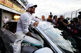 Lewis Hamilton (GBR) Mercedes AMG F1 celebrates his pole position in parc ferme. 25.03.2017. Formula 1 World Championship, Rd 1, Australian Grand Prix, Albert Park, Melbourne, Australia, Qualifying Day.