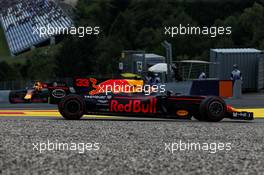 Max Verstappen (NLD) Red Bull Racing RB13 spins in front of Daniel Ricciardo (AUS) Red Bull Racing RB13. 07.07.2017. Formula 1 World Championship, Rd 9, Austrian Grand Prix, Spielberg, Austria, Practice Day.