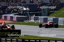 Sebastian Vettel (GER) Ferrari SF70H spins and is passed by Max Verstappen (NLD) Red Bull Racing RB13 in the first practice session. 07.07.2017. Formula 1 World Championship, Rd 9, Austrian Grand Prix, Spielberg, Austria, Practice Day.