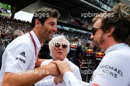 (L to R): Mark Webber (AUS) with Bernie Ecclestone (GBR) and Fernando Alonso (ESP) McLaren on the grid. 09.07.2017. Formula 1 World Championship, Rd 9, Austrian Grand Prix, Spielberg, Austria, Race Day.