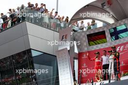 The podium (L to R): Sebastian Vettel (GER) Ferrari, second; Valtteri Bottas (FIN) Mercedes AMG F1, race winner; Daniel Ricciardo (AUS) Red Bull Racing, third. 09.07.2017. Formula 1 World Championship, Rd 9, Austrian Grand Prix, Spielberg, Austria, Race Day.