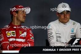 (L to R): Sebastian Vettel (GER) Ferrari with Valtteri Bottas (FIN) Mercedes AMG F1 in the FIA Press Conference. 09.07.2017. Formula 1 World Championship, Rd 9, Austrian Grand Prix, Spielberg, Austria, Race Day.