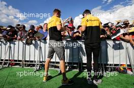 (L to R): Nico Hulkenberg (GER) Renault Sport F1 Team and team mate Jolyon Palmer (GBR) Renault Sport F1 Team sign autographs for the fans. 06.07.2017. Formula 1 World Championship, Rd 9, Austrian Grand Prix, Spielberg, Austria, Preparation Day.