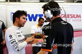 (L to R): Sergio Perez (MEX) Sahara Force India F1 with Tim Wright (GBR) Sahara Force India F1 Team Race Engineer. 23.06.2017. Formula 1 World Championship, Rd 8, Azerbaijan Grand Prix, Baku Street Circuit, Azerbaijan, Practice Day.