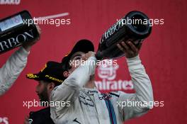 Lance Stroll (CDN) Williams celebrates his third position on the podium. 25.06.2017. Formula 1 World Championship, Rd 8, Azerbaijan Grand Prix, Baku Street Circuit, Azerbaijan, Race Day.