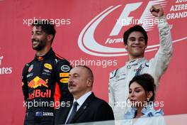The podium (L to R): Race winner Daniel Ricciardo (AUS) Red Bull Racing with third placed Lance Stroll (CDN) Williams. 25.06.2017. Formula 1 World Championship, Rd 8, Azerbaijan Grand Prix, Baku Street Circuit, Azerbaijan, Race Day.