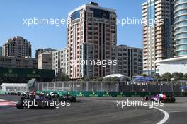 Daniil Kvyat (RUS) Scuderia Toro Rosso STR12 runs wide at the start of the race. 25.06.2017. Formula 1 World Championship, Rd 8, Azerbaijan Grand Prix, Baku Street Circuit, Azerbaijan, Race Day.