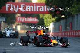 Daniel Ricciardo (AUS) Red Bull Racing and Lance Stroll (CDN) Williams F1 Team  25.06.2017. Formula 1 World Championship, Rd 8, Azerbaijan Grand Prix, Baku Street Circuit, Azerbaijan, Race Day.