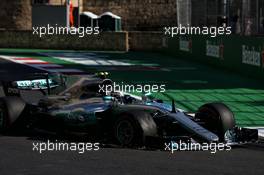 Valtteri Bottas (FIN) Mercedes AMG F1 W08 with a puncture and a broken front wing on the opening lap of the race. 25.06.2017. Formula 1 World Championship, Rd 8, Azerbaijan Grand Prix, Baku Street Circuit, Azerbaijan, Race Day.