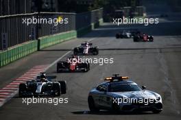 Lewis Hamilton (GBR) Mercedes AMG F1 W08 leads behind the FIA Safety Car. 25.06.2017. Formula 1 World Championship, Rd 8, Azerbaijan Grand Prix, Baku Street Circuit, Azerbaijan, Race Day.