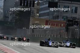 Pascal Wehrlein (GER) Sauber C36 and team mate Marcus Ericsson (SWE) Sauber C36. 25.06.2017. Formula 1 World Championship, Rd 8, Azerbaijan Grand Prix, Baku Street Circuit, Azerbaijan, Race Day.