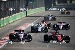 Sergio Perez (MEX) Sahara Force India F1 VJM10 and Sebastian Vettel (GER) Ferrari SF70H battle for position. 25.06.2017. Formula 1 World Championship, Rd 8, Azerbaijan Grand Prix, Baku Street Circuit, Azerbaijan, Race Day.