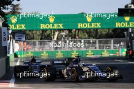 Marcus Ericsson (SWE) Sauber C36 leads team mate Pascal Wehrlein (GER) Sauber C36. 25.06.2017. Formula 1 World Championship, Rd 8, Azerbaijan Grand Prix, Baku Street Circuit, Azerbaijan, Race Day.