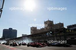 Valtteri Bottas (FIN) Mercedes AMG F1 W08 leads Kimi Raikkonen (FIN) Ferrari SF70H and Sebastian Vettel (GER) Ferrari SF70H at the start of the race. 25.06.2017. Formula 1 World Championship, Rd 8, Azerbaijan Grand Prix, Baku Street Circuit, Azerbaijan, Race Day.