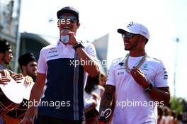 (L to R): Lance Stroll (CDN) Williams and Lewis Hamilton (GBR) Mercedes AMG F1 on the drivers parade. 25.06.2017. Formula 1 World Championship, Rd 8, Azerbaijan Grand Prix, Baku Street Circuit, Azerbaijan, Race Day.