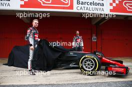 (L to R): Kevin Magnussen (DEN) Haas F1 Team and team mate Romain Grosjean (FRA) Haas F1 Team unveil the Haas VF-17. 27.02.2017. Formula One Testing, Day One, Barcelona, Spain. Monday.