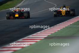Max Verstappen (NLD) Red Bull Racing RB13 and Jolyon Palmer (GBR) Renault Sport F1 Team RS17. 02.03.2017. Formula One Testing, Day Four, Barcelona, Spain. Thursday.