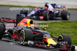 Max Verstappen (NLD) Red Bull Racing RB13 leads Daniil Kvyat (RUS) Scuderia Toro Rosso STR12. 28.02.2017. Formula One Testing, Day Two, Barcelona, Spain. Tuesday.