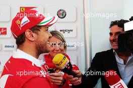 Sebastian Vettel (GER) Ferrari with the media. 01.03.2017. Formula One Testing, Day Three, Barcelona, Spain. Wednesday.