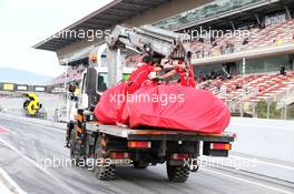 The Ferrari SF70H of Kimi Raikkonen (FIN) Ferrari is recovered back to the pits on the back of a truck.. 08.03.2017. Formula One Testing, Day Two, Barcelona, Spain. Wednesday.