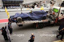 The Red Bull Racing RB13 of Max Verstappen (NLD) Red Bull Racing is recovered back to the pits on the back of a truck. 08.03.2017. Formula One Testing, Day Two, Barcelona, Spain. Wednesday.