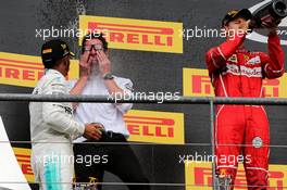 Race winner Lewis Hamilton (GBR) Mercedes AMG F1 celebrates with Andrew Shovlin (GBR) Mercedes AMG F1 Engineer on the podium. 27.08.2017. Formula 1 World Championship, Rd 12, Belgian Grand Prix, Spa Francorchamps, Belgium, Race Day.