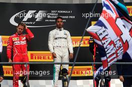 The podium (L to R): second placed Sebastian Vettel (GER) Ferrari and race winner Lewis Hamilton (GBR) Mercedes AMG F1. 27.08.2017. Formula 1 World Championship, Rd 12, Belgian Grand Prix, Spa Francorchamps, Belgium, Race Day.