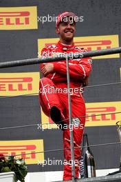 Sebastian Vettel (GER) Ferrari on the podium. 27.08.2017. Formula 1 World Championship, Rd 12, Belgian Grand Prix, Spa Francorchamps, Belgium, Race Day.