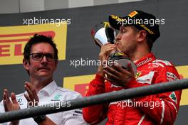 Sebastian Vettel (GER) Ferrari celebrates his second position on the podium. 27.08.2017. Formula 1 World Championship, Rd 12, Belgian Grand Prix, Spa Francorchamps, Belgium, Race Day.