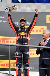Daniel Ricciardo (AUS) Red Bull Racing celebrates his third position on the podium. 27.08.2017. Formula 1 World Championship, Rd 12, Belgian Grand Prix, Spa Francorchamps, Belgium, Race Day.