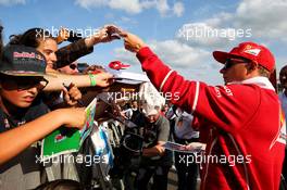 Kimi Raikkonen (FIN) Ferrari signs autographs for the fans. 24.08.2017. Formula 1 World Championship, Rd 12, Belgian Grand Prix, Spa Francorchamps, Belgium, Preparation Day.
