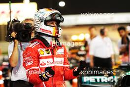 Race winner Sebastian Vettel (GER) Ferrari celebrates in parc ferme. 16.04.2017. Formula 1 World Championship, Rd 3, Bahrain Grand Prix, Sakhir, Bahrain, Race Day.