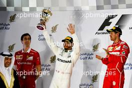 Lewis Hamilton (GBR) Mercedes AMG F1 celebrates his second position on the podium. 16.04.2017. Formula 1 World Championship, Rd 3, Bahrain Grand Prix, Sakhir, Bahrain, Race Day.