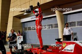 Race winner Sebastian Vettel (GER) Ferrari SF70H celebrates in parc ferme. 16.04.2017. Formula 1 World Championship, Rd 3, Bahrain Grand Prix, Sakhir, Bahrain, Race Day.