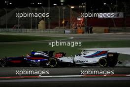 Lance Stroll (CDN) Williams FW40 and Carlos Sainz Jr (ESP) Scuderia Toro Rosso STR12 crash. 16.04.2017. Formula 1 World Championship, Rd 3, Bahrain Grand Prix, Sakhir, Bahrain, Race Day.