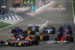 Daniel Ricciardo (AUS) Red Bull Racing RB13 and Max Verstappen (NLD) Red Bull Racing RB13 at the start of the race. 16.04.2017. Formula 1 World Championship, Rd 3, Bahrain Grand Prix, Sakhir, Bahrain, Race Day.