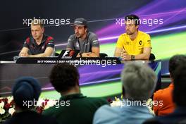 (L to R): Kevin Magnussen (DEN) Haas F1 Team; Fernando Alonso (ESP) McLaren; and Jolyon Palmer (GBR) Renault Sport F1 Team, in the FIA Press Conference. 13.04.2017. Formula 1 World Championship, Rd 3, Bahrain Grand Prix, Sakhir, Bahrain, Preparation Day.