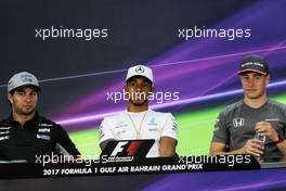 (L to R): Sergio Perez (MEX) Sahara Force India F1; Lewis Hamilton (GBR) Mercedes AMG F1; and Stoffel Vandoorne (BEL) McLaren, in the FIA Press Conference. 13.04.2017. Formula 1 World Championship, Rd 3, Bahrain Grand Prix, Sakhir, Bahrain, Preparation Day.