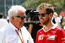 (L to R): Charlie Whiting (GBR) FIA Delegate with Sebastian Vettel (GER) Ferrari. 13.04.2017. Formula 1 World Championship, Rd 3, Bahrain Grand Prix, Sakhir, Bahrain, Preparation Day.