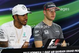 (L to R): Lewis Hamilton (GBR) Mercedes AMG F1 and Stoffel Vandoorne (BEL) McLaren in the FIA Press Conference. 13.04.2017. Formula 1 World Championship, Rd 3, Bahrain Grand Prix, Sakhir, Bahrain, Preparation Day.
