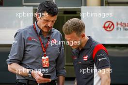 Guenther Steiner (ITA) Haas F1 Team Prinicipal with Kevin Magnussen (DEN) Haas F1 Team. 13.04.2017. Formula 1 World Championship, Rd 3, Bahrain Grand Prix, Sakhir, Bahrain, Preparation Day.