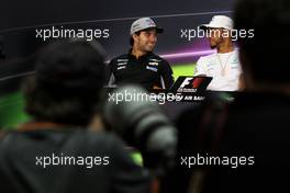 (L to R): Sergio Perez (MEX) Sahara Force India F1 and Lewis Hamilton (GBR) Mercedes AMG F1 in the FIA Press Conference. 13.04.2017. Formula 1 World Championship, Rd 3, Bahrain Grand Prix, Sakhir, Bahrain, Preparation Day.