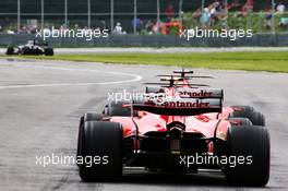 Kimi Raikkonen (FIN) Ferrari SF70H and Sebastian Vettel (GER) Ferrari SF70H at the pit lane exit. 09.06.2017. Formula 1 World Championship, Rd 7, Canadian Grand Prix, Montreal, Canada, Practice Day.