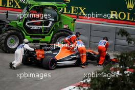 The McLaren MCL32 of Fernando Alonso (ESP) McLaren is removed from the circuit after he stopped in the first practice session. 09.06.2017. Formula 1 World Championship, Rd 7, Canadian Grand Prix, Montreal, Canada, Practice Day.