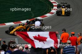 Nico Hulkenberg (GER) Renault Sport F1 Team RS17 and team mate Jolyon Palmer (GBR) Renault Sport F1 Team RS17. 09.06.2017. Formula 1 World Championship, Rd 7, Canadian Grand Prix, Montreal, Canada, Practice Day.
