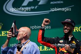 Daniel Ricciardo (AUS) Red Bull Racing celebrates his third position on the podium with Sir Patrick Stewart (GBR) Actor. 11.06.2017. Formula 1 World Championship, Rd 7, Canadian Grand Prix, Montreal, Canada, Race Day.