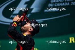 Daniel Ricciardo (AUS) Red Bull Racing celebrates his third position on the podium. 11.06.2017. Formula 1 World Championship, Rd 7, Canadian Grand Prix, Montreal, Canada, Race Day.