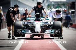 Mercedes AMG F1 W08 of Lewis Hamilton (GBR) Mercedes AMG F1 pushed down the pit lane. 08.06.2017. Formula 1 World Championship, Rd 7, Canadian Grand Prix, Montreal, Canada, Preparation Day.